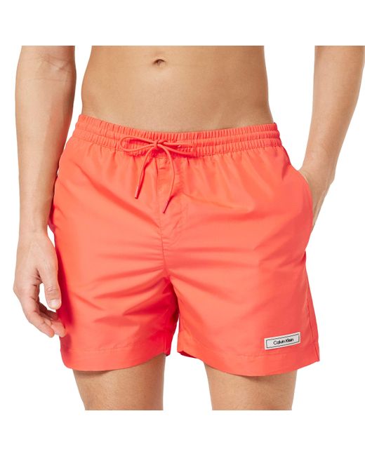 Pantaloncino da Bagno Uomo Medium Drawstring Lungo di Calvin Klein in Orange da Uomo