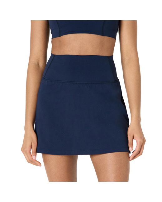Amazon Essentials Blue Active FormFlex Buttery Soft Tennisrock mit integrierter Shorts und Taschen