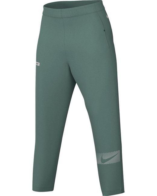 Herren Dri-fit Flsh Chllgr Woven Pnt Pantalón Nike de hombre de color Green