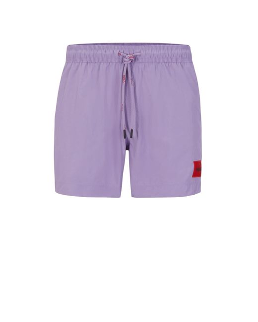 HUGO Dominica Schnell trocknende Badeshorts mit rotem Logo-Etikett Flieder XL in Purple für Herren