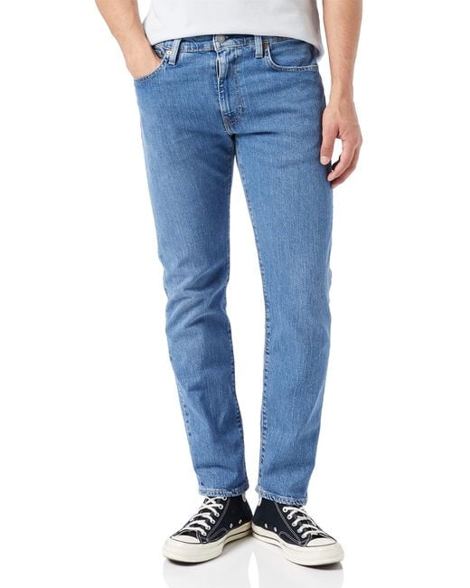 502 Taper Jeans di Levi's in Blue da Uomo