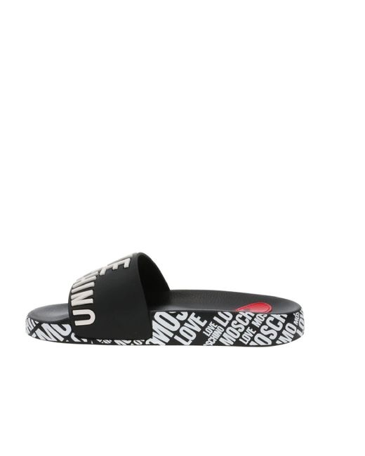 Love Moschino Black Rubber Slipper With Lettering Logo All Over ...