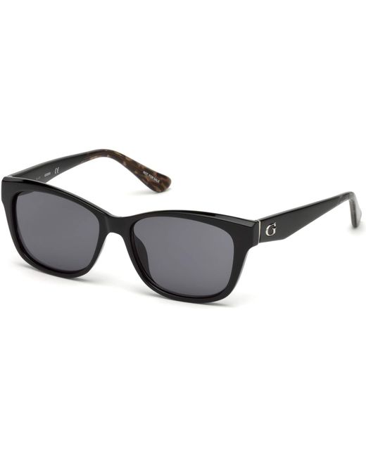 GU7538 Lunettes de soleil rectangulaires pour femme + paquet avec kit d'entretien des lunettes de designer iWear Guess en coloris Black