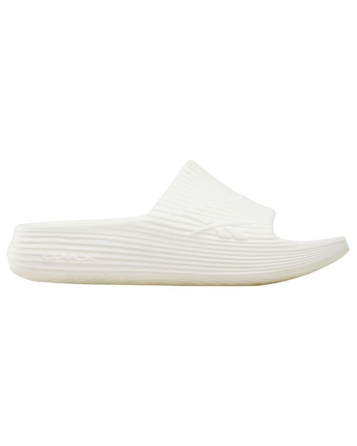 DMX Comfort + Slide di Reebok in Black