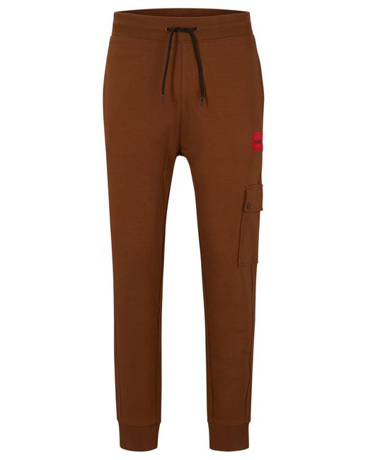 HUGO Relaxed-Fit Jogginghose mit rotem Logo-Label in Brown für Herren
