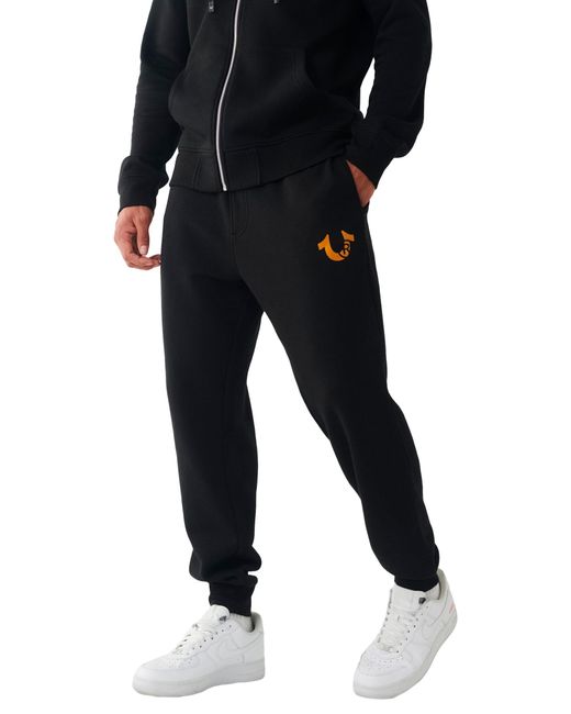 True Religion World Tour Zip Up Jogger Trainingshose in Black für Herren
