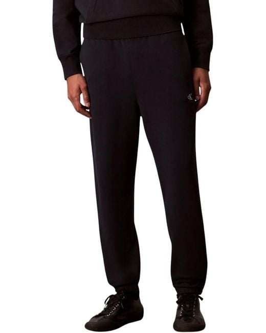 Uomo Pantaloni da Jogging Terry Monogram con Tasca Posteriore di Calvin Klein in Blue da Uomo
