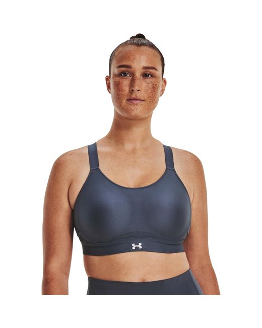 UA Infinity Crossover High Sport Bras di Under Armour in Blue