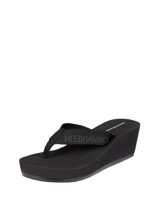 black wedge flip flops uk