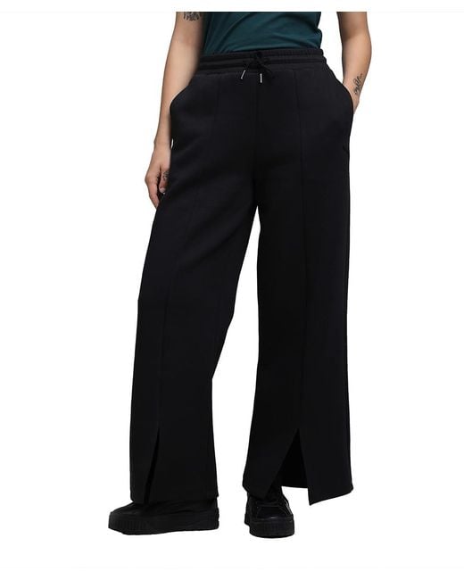 Pantaloni da donna Wardrobe Essentials Relaxed di PUMA in Nero Lyst - Main Image