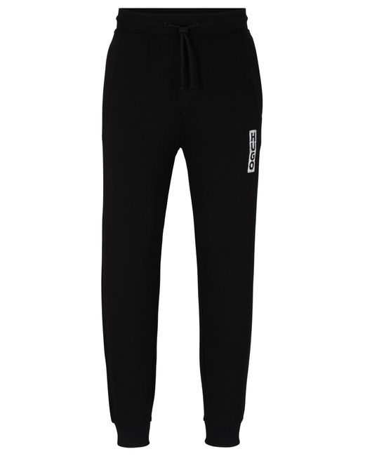 HUGO Black Cotton-terry Tracksuit Bottoms With Vertical Logo for men
