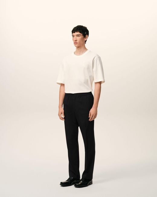 AMI Black Wool Elasticated Waist Trousers for men