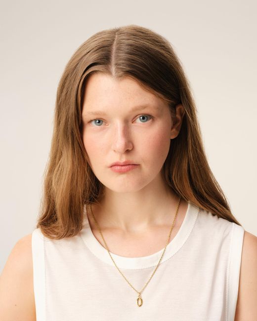 AMI Natural Brass Hammered "0" Pendant Necklace