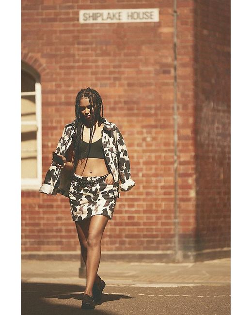 By Anthropologie Brown Cow Print Mini Skirt