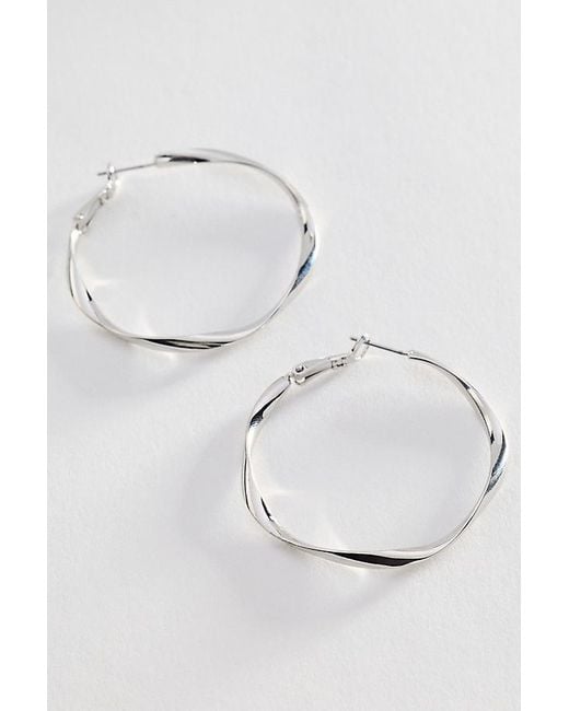 By Anthropologie Metallic Hammered Hoop Earrings