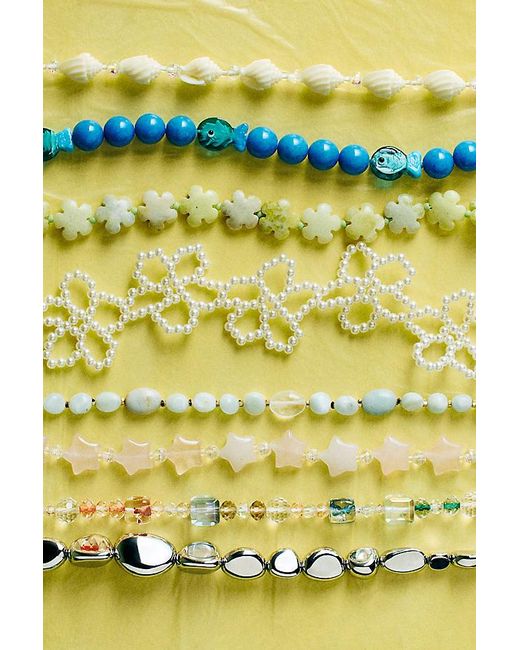 By Anthropologie Natural Chunky Phone Chain