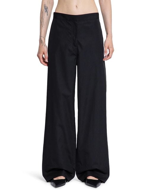 Totême Black Twisted Seam Trousers