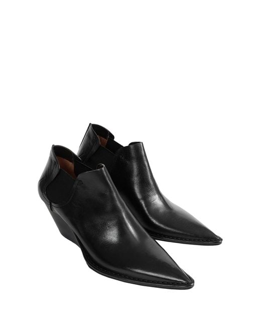 Capasa Black Low-Cut Leather Ankle Boots