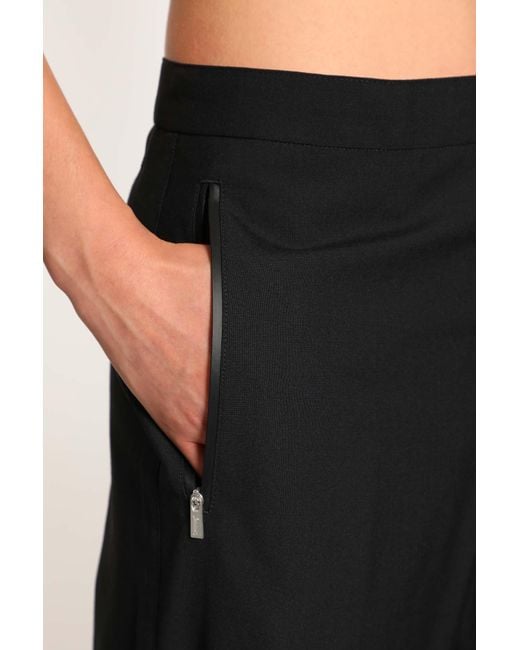 Laminar Black Twisted Tailored Trousers for men