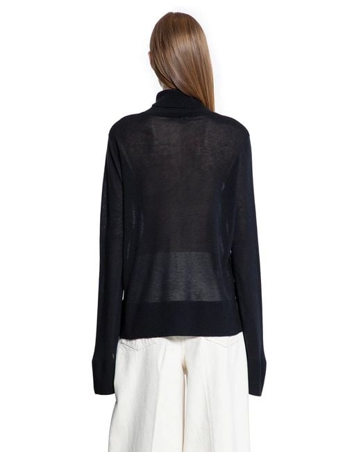 Totême Black Slit Sleeve Turtleneck