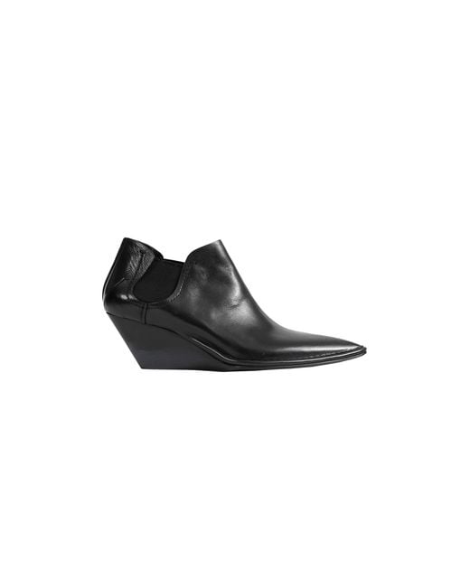 Capasa Black Low-Cut Leather Ankle Boots