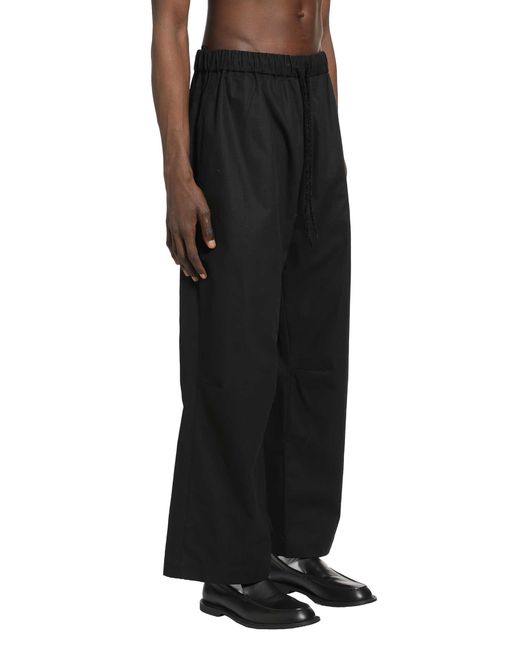Simone Rocha Black Elasticated Knee Pleat Trousers for men