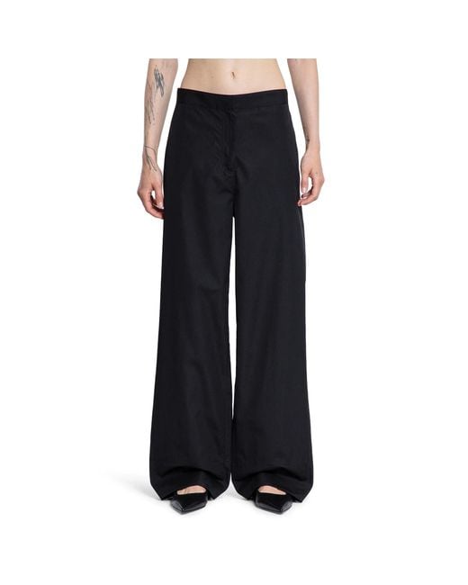Totême Black Twisted Seam Trousers