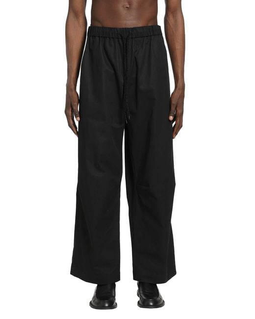Simone Rocha Black Elasticated Knee Pleat Trousers for men