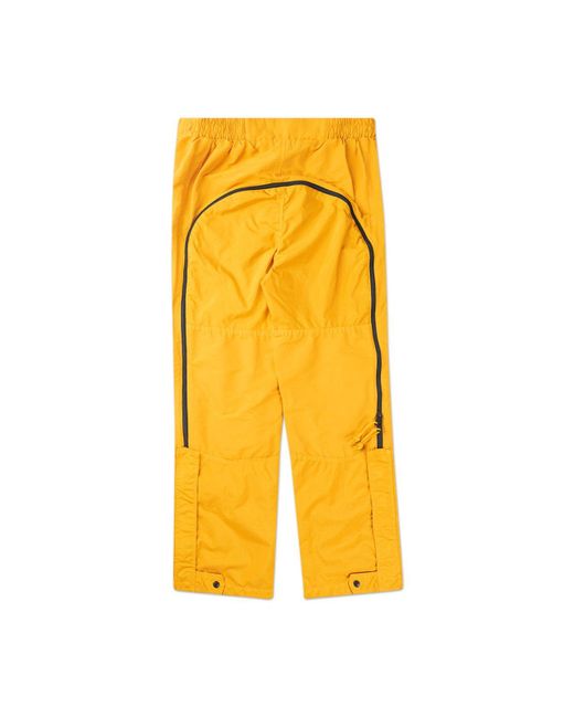 yellow north face pants