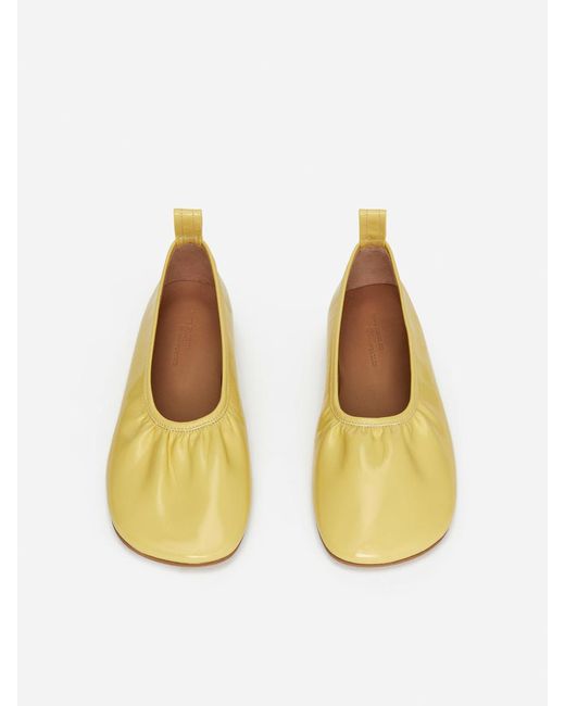 ARKET Yellow Lacquered Ballet Flats