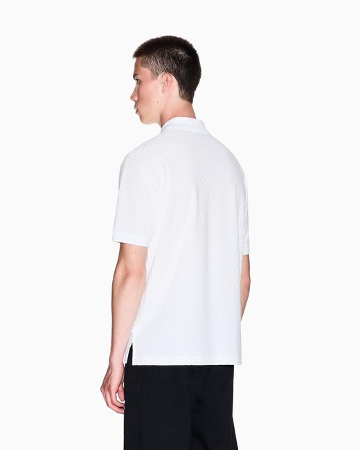 Polo Regular Fit Logo Allover di ARMANI EXCHANGE in White da Uomo