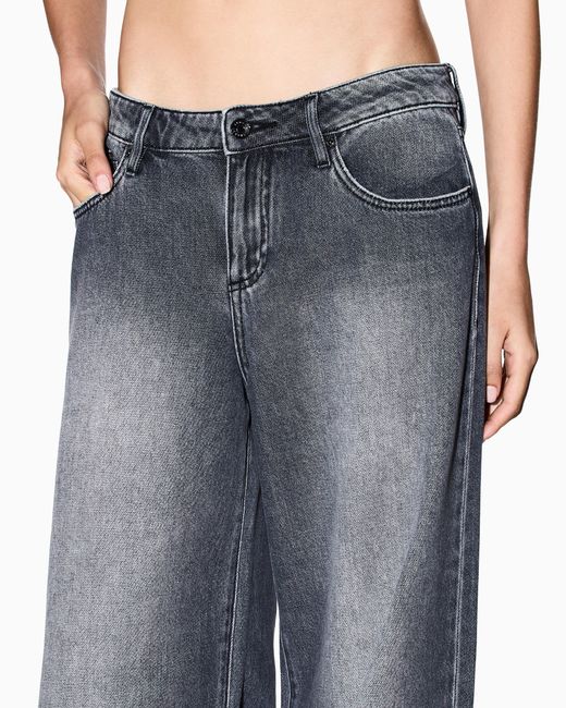 Vaqueros De Pierna Ancha De Mezclilla Lavada A La Piedra ARMANI EXCHANGE de color Blue