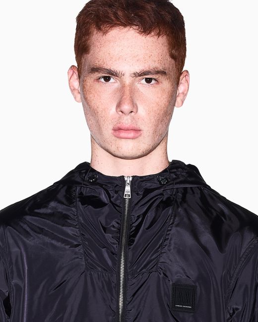 ARMANI EXCHANGE Blue Hooded Nylon Windbreaker Icon With A Zip And Logo Patch for men
