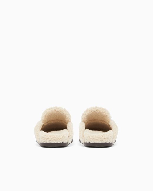ARMANI EXCHANGE White Suede Clogs With Teddy Details