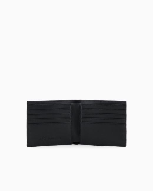 ARMANI EXCHANGE Black Bi-Fold Wallet With An Embossed Logo Pattern And Card Slots for men