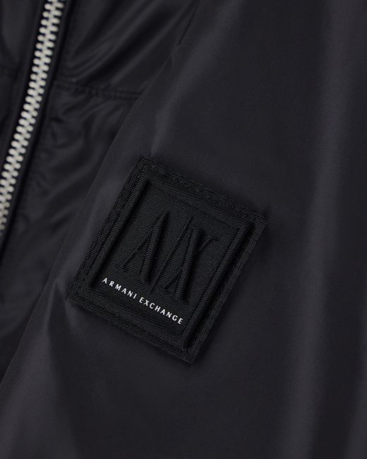 ARMANI EXCHANGE Blue Hooded Nylon Windbreaker Icon With A Zip And Logo Patch for men