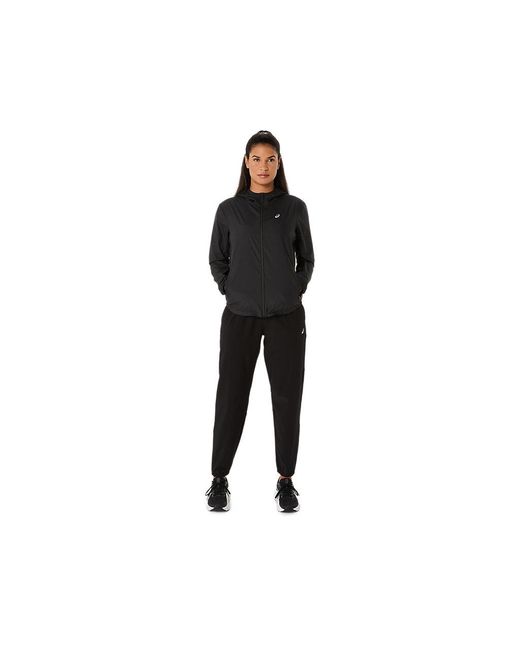 Core Woven Pant di Asics in Black