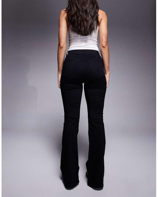 Vaqueros De Campana Negros Muy Elásticos Moldeadores De Hourglass ASOS de color Blue
