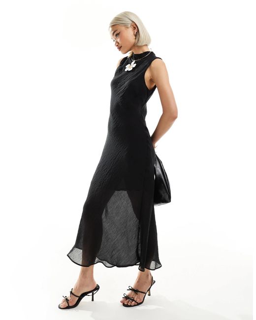 Robe mi-longue à jupe transparente Mango en coloris White