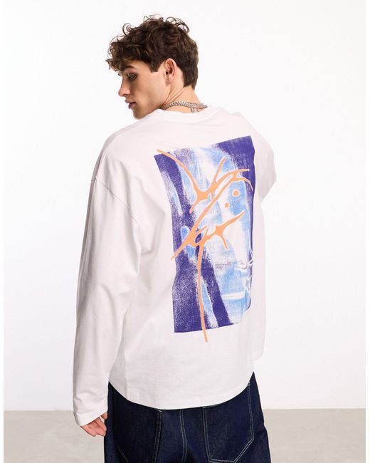 T-shirt style skateur à manches longues avec motif sur le devant et dans le dos Collusion pour homme en coloris White