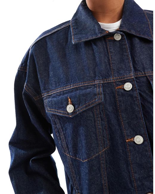 Veste oversize en jean style années 90 - délavage brut ASOS en coloris Blue