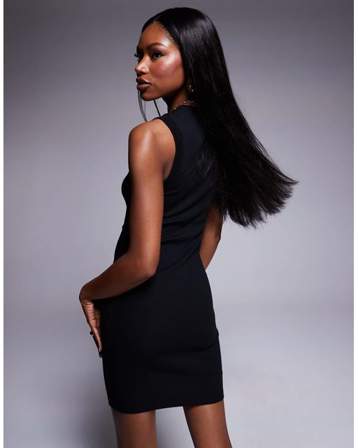 Robe courte côtelée sans manches style années 90 ASOS en coloris Black