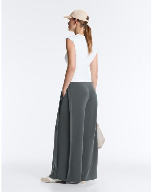 Oysho White Soft-touch Wide-leg Trousers With Side Pleat And Modal