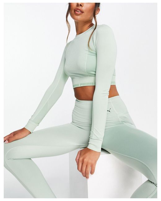 PUMA Synthetic Training Evoknit Seamless Long Sleeve Crop Top in Green -  Lyst