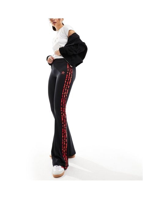 adidas Originals Leopard Luxe Flared leggings in Black