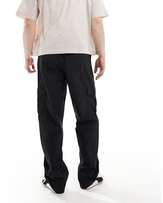 Pantalones Cargo Negros Holgados Sin Cierres De ASOS de hombre de color White
