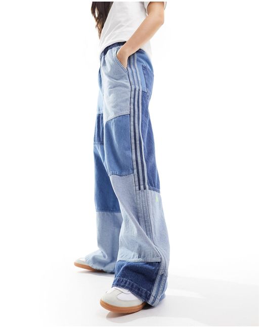 X ksenia schnaider - jean en denim effet patchwork Adidas Originals en coloris Blue