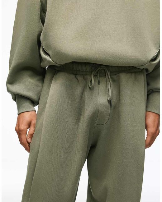 Bershka Green Balloon Fit Washed joggers With Pleats for men