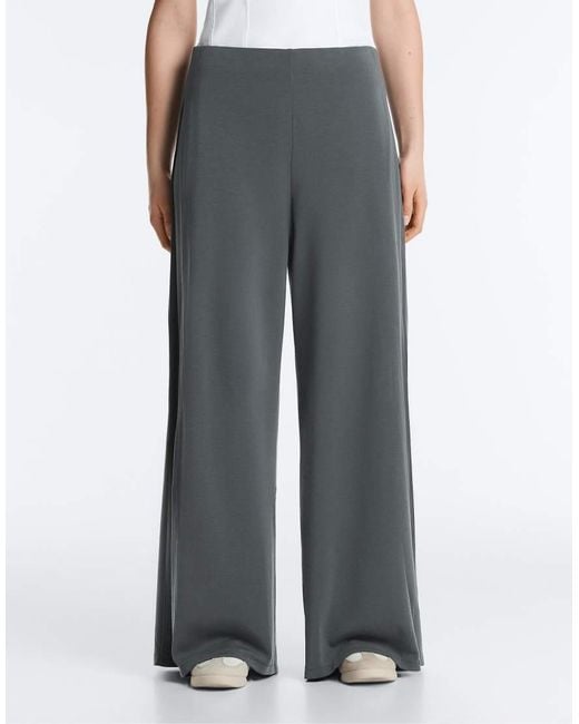 Oysho White Soft-touch Wide-leg Trousers With Side Pleat And Modal