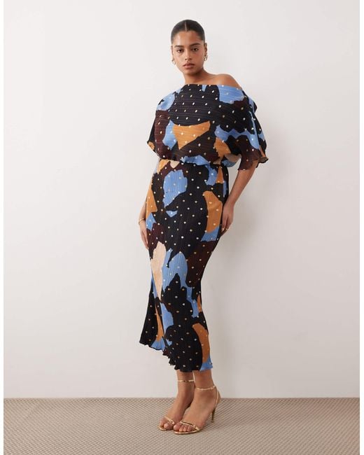 Never Fully Dressed Tilly Asymmetric Gold Foil Plisse Maxi Dress in Blue |  Lyst